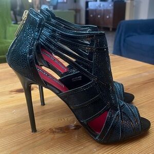 - Charles Jourdan Paris, leather sole, cutout heels black size 8